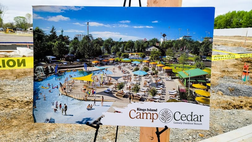 Kings Island Camp Cedar Luxury Outdoor Resort is under construction with an anticipated June 2021 opening date. The opening date was postponed for a second time. The resort features RV parking spaces and two types of cottages that sleep up to 8 people, two pools, a lodge, restaurant and more. NICK GRAHAM / STAFF