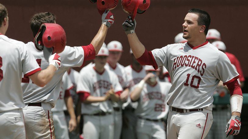 Indiana’s Kyle Schwarber, a graduate of Middletown High School, celebrates with teammates after hitting a two-run home run in the fourth inning against Florida State in an NCAA Super Regional college baseball game on Saturday, June 8, in Tallahassee, Fla. Indiana won the game 10-9.