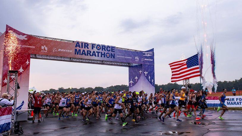 Fireworks go off at the start of the Air Force Marathon held Sept. 21, 2019, at Wright-Patterson Air Force Base. Fireworks at the start line were added to last year’s marathon to add more excitement and entertainment to the race. Again this year, gift registrations for the race can be purchased for junior enlisted members stationed at Wright-Patt Air Force Base. (U.S. Air Force photo/Wesley Farnsworth)