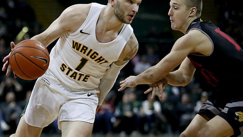 Wright State University forward Bill Wampler is covered by IUPUI guard Mike DePersia during their Horizon League game at the Nutter Center in Fairborn Sunday, Feb. 16, 2020. Wright State won 106-66. Contributed photo by E.L. Hubbard