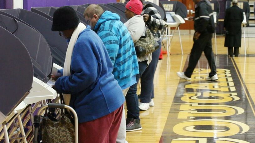 Dayton voter turnout at Thurgood Marshall High School was light but steady according to poll workers. TY GREENLEES / STAFF