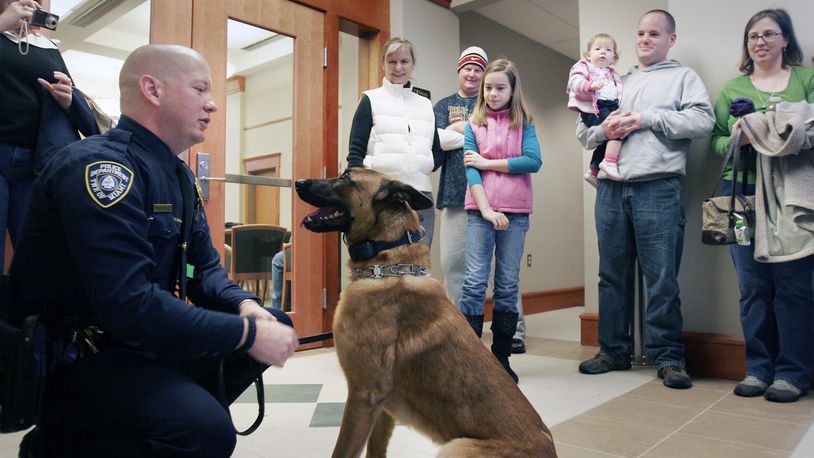 Miami Twp. Police Department K-9 officer Coron, shown here is this file photo, is being sold to his handler as the department’s K-9 unit is disbanding. The 8-year-old Belgian Malinois has been with the department since it started the K-9 unit in 2011. JIM NOELKER/STAFF