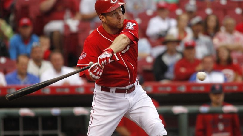 The Reds' Todd Frazier swings at a ball against the Cardinals on Thursday, Aug. 6, 2015, at Great American Ball Park in Cincinnati. David Jablonski/Staff