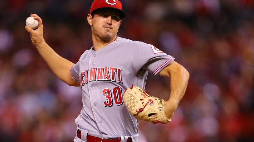 Tyler Mahle of the Cincinnati Reds pitches against the St. Louis Cardinals at Busch Stadium late last season. (Photo by Dilip Vishwanat/Getty Images)