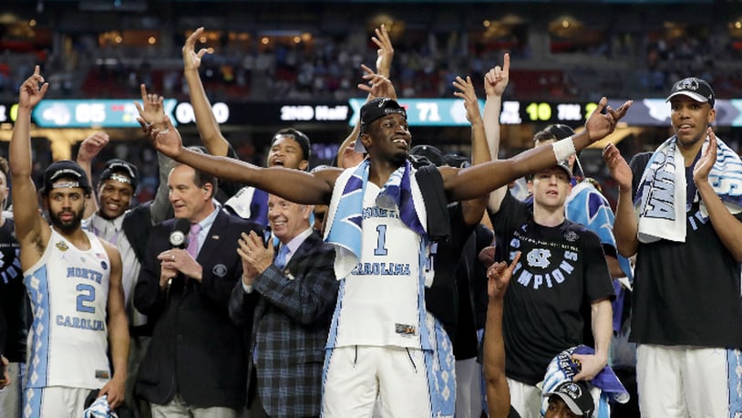 North Carolina's Theo Pinson (1) and the rest of the team celebrate after the finals of the Final Four NCAA college basketball tournament against Gonzaga, Monday, April 3, 2017, in Glendale, Ariz. North Carolina won 71-65. (AP Photo/David J. Phillip)