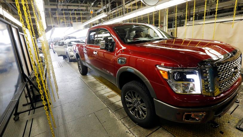 A newly completed Titan rolls off the line at the Nissan Canton Vehicle Assembly Plant in Canton, Miss. in 2016. AP Photo/Rogelio V. Solis