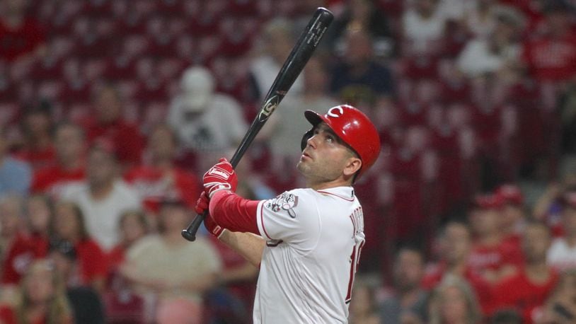 The Reds' Joey Votto swings during a game against the Brewers on July 2, 2019, at Great American Ball Park in Cincinnati.