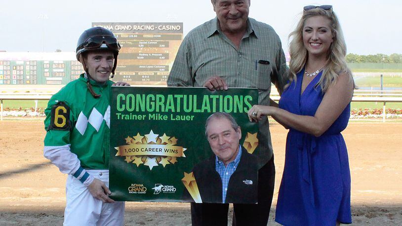 Mike Lauer, a Hamilton native, was honored for his 1,000th career training victory at Indiana Grand. He was joined by jockey Declan Cannon, who guided Miracles Take Time to the win. Racing analyst Rachel McLaughlin made the presentation.