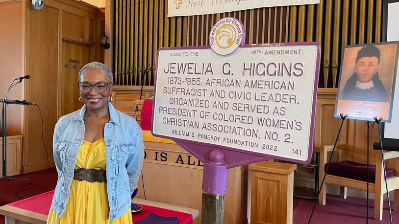 Patricia Smith Griffin smiles next to a historic marker honoring her great grandmother Jewelia Galloway Higgins, a suffragist, leader and activist. It will be placed on the National Votes for Women Trail.