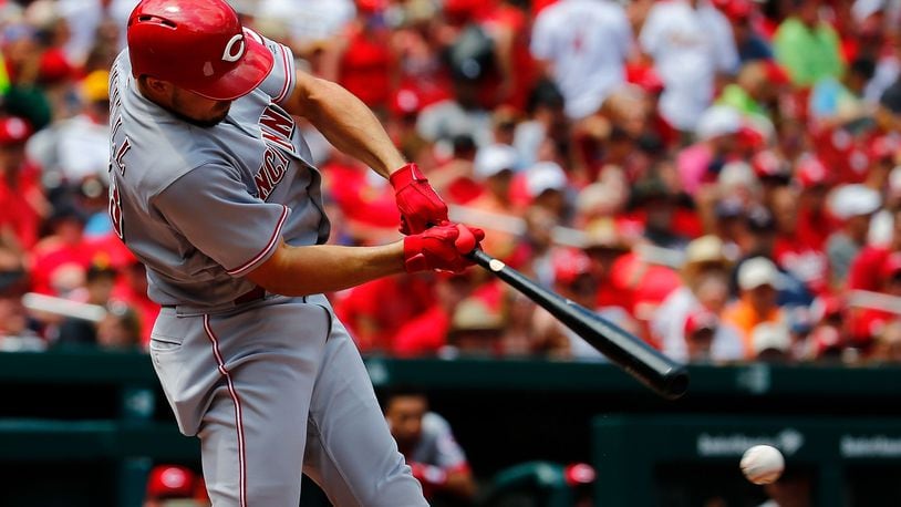 ST. LOUIS, MO - JULY 15:  Adam Duvall #23 of the Cincinnati Reds hits a two-run single against the St. Louis Cardinals in the fourth inning at Busch Stadium on July 15, 2018 in St. Louis, Missouri.  (Photo by Dilip Vishwanat/Getty Images)