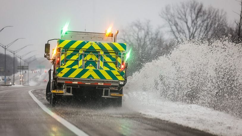 A snowplow pushes snow off Ohio 35 near Dayton Wednesday morning January 25, 2023. The 5 inches of snow that fell in Dayton on Wednesday broke a daily snowfall record for the day of 4.9 inches set in 1915, according to the National Weather Service. JIM NOELKER/STAFF