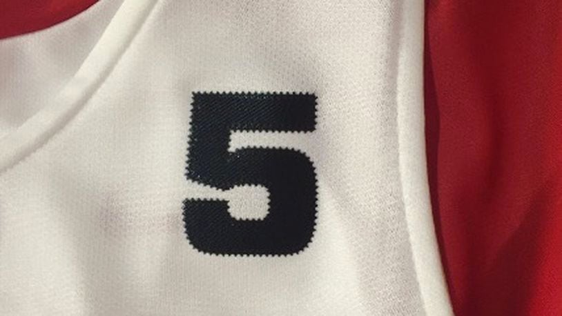 The No. 5 honoring Steve McElvene on Dayton’s uniforms.