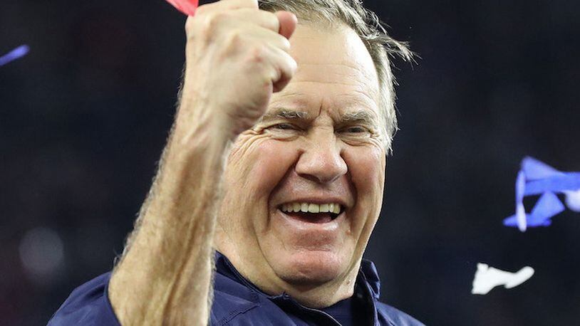 New England Patriots head coach Bill Belichick pumps his fist after beating the Atlanta Falcons, 34-28, in Super Bowl LI on February 5, 2017, at NRG Stadium in Houston, Texas. (Curtis Compton/Atlanta Journal-Constitution/TNS)