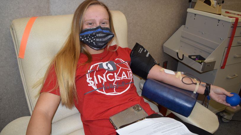 Volleyball player Madison Simon of Brookville is one of several Sinclair Community College athletes to donate blood Oct. 23, 2020, at the Dayton CBC to continue a fall tradition even though the COVID-19 pandemic shut down all sports this season. CONTRIBUTED