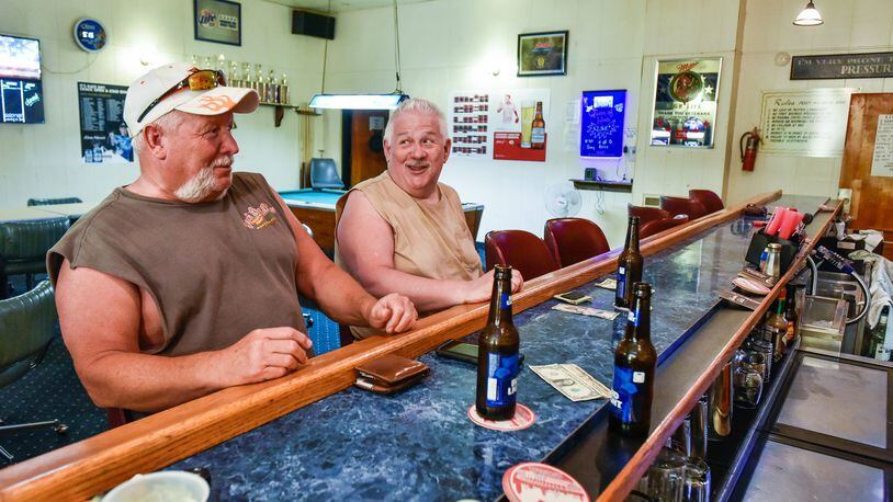 Doug Freeze (left) and Larry Black at the bar inside The American Legion in Franklin. The American Legion Post 149 in Franklin is struggling with membership and will close during the summer with hopes of opening back up in September.