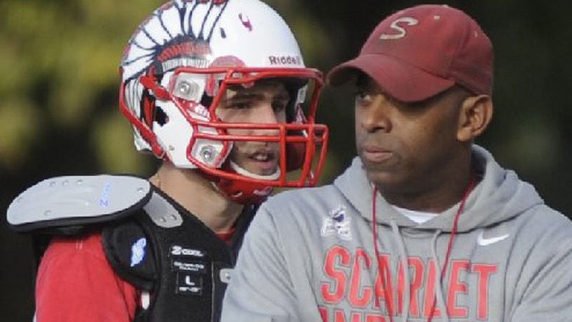 Then-head coach Trace Smitherman (right) guided Stebbins to its best high school football season in two decades in 2015. MARC PENDLETON / STAFF
