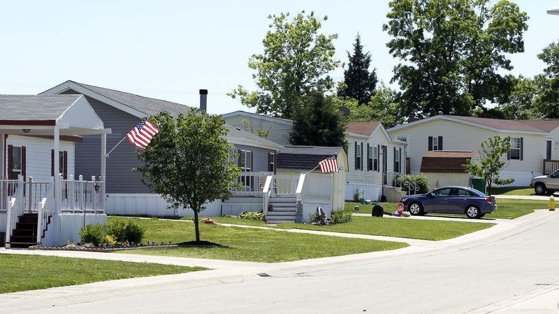 The sales of modular homes, like these in Oakwood Village in Miamisburg, are on the rise in Ohio after a slump over the past several years. TY GREENLEES / STAFF