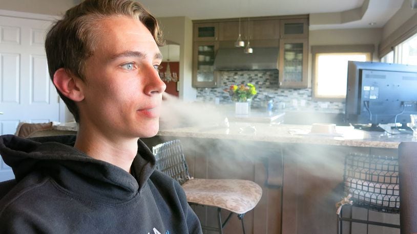 Julien Lavandier, a Colorado State University student, started smoking e-cigarettes as a high school sophomore. He says he’s now hooked on Juul and has been unable to quit. (John Daley/Kaiser Health News/TNS)