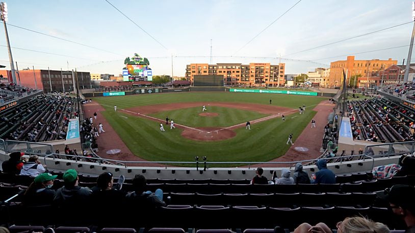 People sit social distanced during opening day for the Dayton Dragons at Day Air Ballpark in Dayton May 11, 2021. Contributed photo by E.L. Hubbard
