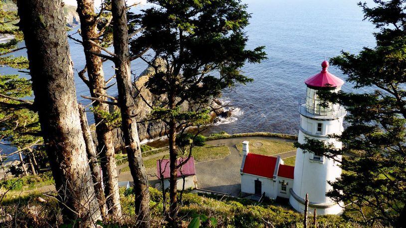 Hiking trails offer peekaboo views from above the Heceta Head Lighthouse. (Brian J. Cantwell/Seattle Times/TNS)