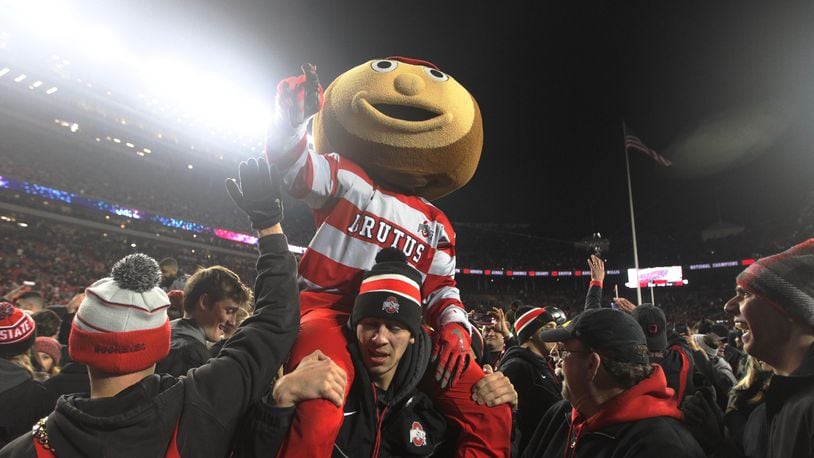 Brutus the Buckeye gets carried off the field after Ohio States victory against Penn State on Saturday, Oct. 28, 2017, at Ohio Stadium in Columbus. David Jablonski/Staff