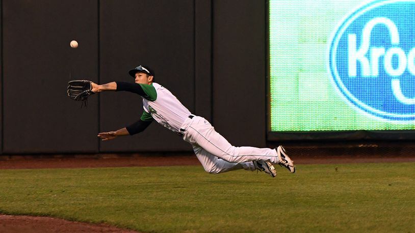 Dayton left fielder Stuart Fairchild dives for a line drive during Friday night’s game at Fifth Third Field. Fairchild made the catch on the play. Nick Falzerano/CONTRIBUTED