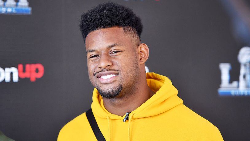 Juju Smith-Schuster interacts with the 5G QB Challenge at the Verizon Experience at Super Bowl Live on Jan. 30, 2019, in Atlanta.