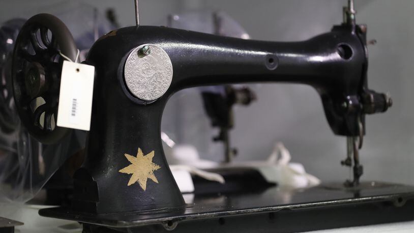 A sewing machine used during the time of the Holocaust is seen in the Personal Artifacts Vault at the U.S. Holocaust Memorial Museum's David and Fela Shapell Family Collections, Conservation and Research Center in Bowie, Md., Monday, April 24, 2017. The Shapell Center is a new state-of-the-art facility that will house the collection of record of the Holocaust. (AP Photo/Carolyn Kaster)