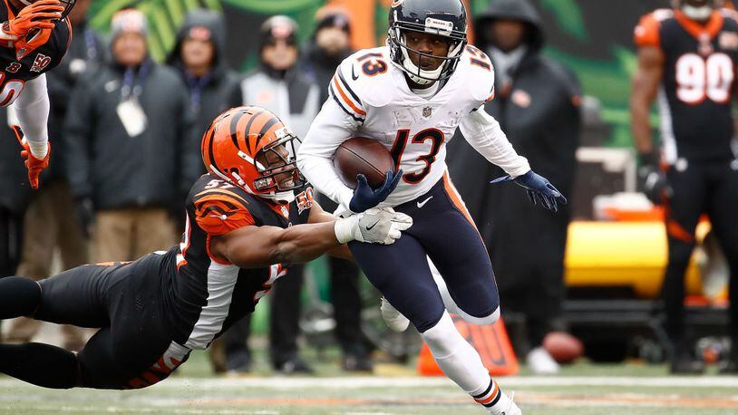 CINCINNATI, OH - DECEMBER 10: Kendall Wright #13 of the Chicago Bears breaks a tackle from Vincent Rey #57 of the Cincinnati Bengals during the first half at Paul Brown Stadium on December 10, 2017 in Cincinnati, Ohio. (Photo by Andy Lyons/Getty Images)