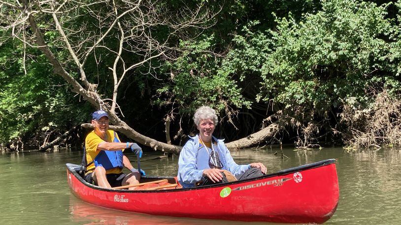 Former Ohio First Lady Hope Taft, left, and former Gov. Bob Taft participate in the Little Miami River Kleeners Clean Sweep on June 7 near Spring Valley. David Jablonski/Staff