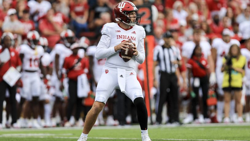 Indiana quarterback Connor Bazelak drops back to pass during the first half of an NCAA college football game against Cincinnati, Saturday, Sept. 24, 2022, in Cincinnati. (AP Photo/Aaron Doster)
