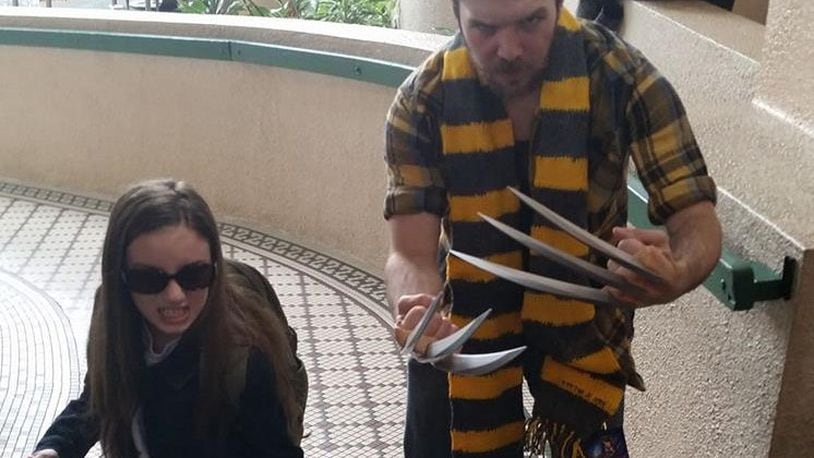 Two X-Men fans do their best Wolverine and X-23 impressions at the Animatic Con. CONTRIBUTED
