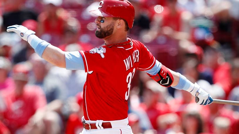 CINCINNATI, OH - JUNE 16: Jesse Winker #33 of the Cincinnati Reds hits a double to center field to drive in two runs in the second inning against the Texas Rangers at Great American Ball Park on June 16, 2019 in Cincinnati, Ohio. (Photo by Joe Robbins/Getty Images)