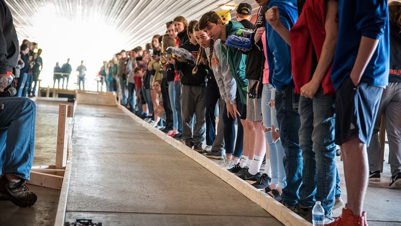 Students from nine local schools watch the remote-controlled car races during the Air Force Research Laboratory’s 7th annual Full Throttle STEM at Eldora Speedway May 14, 2019. U.S. AIR FORCE PHOTO/RICHARD ELDRIDGE