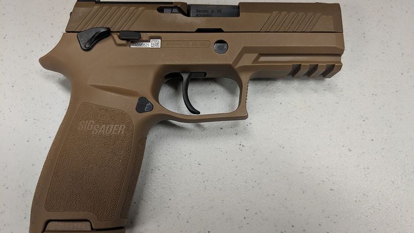 The Air Force Security Forces Center, in partnership with the Air Force Small Arms Program Office, has begun fielding the new M18 Modular Handgun System to Security Forces units. The Air Force Life Cycle Management Center’s Small Arms Program Office acquired approximately 125,000 M18s from Sig Sauer for $22.1 million. (U.S. Air Force photo/Vicki Stein)