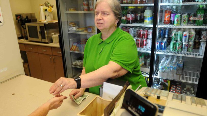 Judy Good working in the snack bar in the Government Services Center in 2009. FILE PHOTO