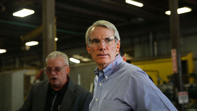 U.S. Sen. Rob Portman tours Pioneer Pipe while campaigning in the area on October 25, 2016 in Marietta, Ohio. Portman is leading Democratic ex-Gov. Ted Strickland by double-digits in the polls. Ohio has become one of the key battleground states in the 2016 presidential election with both candidates or their surrogates making weekly visits to the Buckeye State. Unlike other parts of America, Ohio has both a rapidly aging and declining population; it is also overwhelmingly white and has a high degree of residents without a college education. (Photo by Spencer Platt/Getty Images)