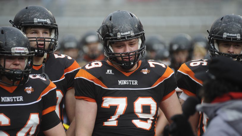 Minster senior lineman Tony Winner (79) and teammates were defeated by Warren JFK 24-6 in the D-VII high school state football championship at Ohio Stadium in Columbus on Saturday. MARC PENDLETON / STAFF