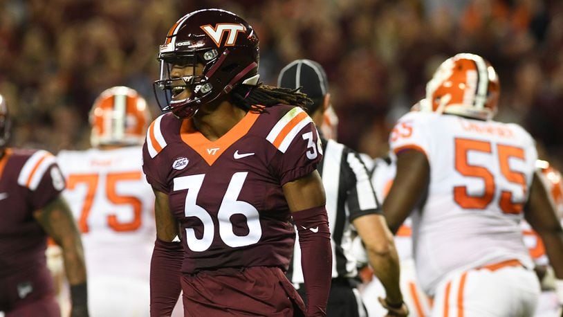 BLACKSBURG, VA - SEPTEMBER 30: Adonis Alexander #36 of the Virginia Tech Hokies celebrates a tackle during the second half against the Clemson Tigers at Lane Stadium on September 30, 2017 in Blacksburg, Virginia. (Photo by Michael Shroyer/Getty Images)