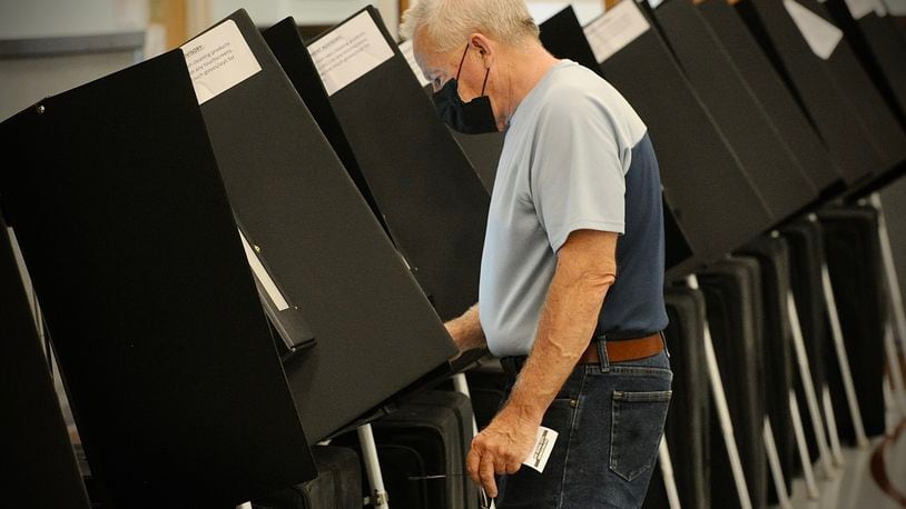Rich Katulak votes Tuesday, Aug. 2, 2022 at the Xenia Grace Chapel in Greene County. MARSHALL GORBY \STAFF