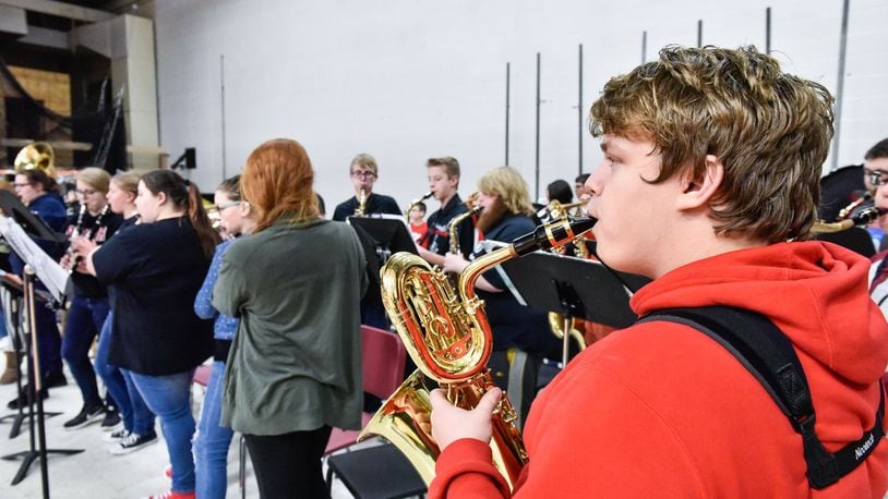 Derek Stidham, a sophomore with the Franklin High School pep band, plays his baritone saxophone before a basketball game Jan. 26 at Franklin High School. NICK GRAHAM/STAFF