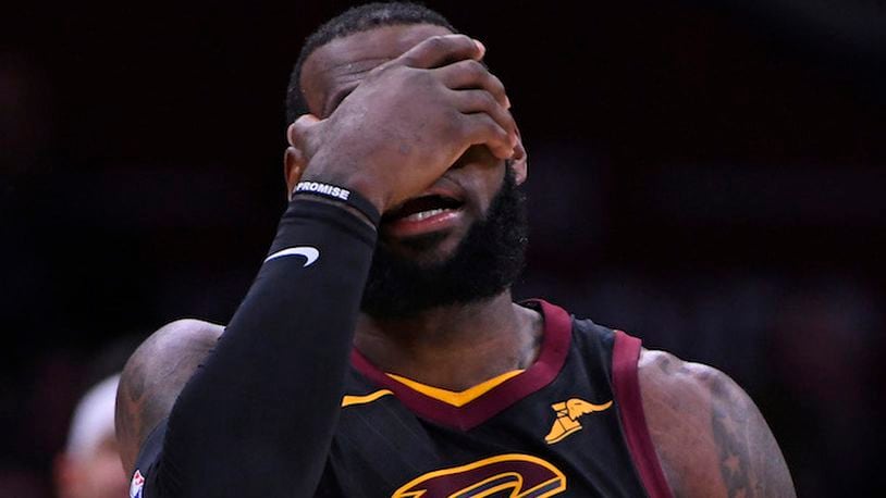 The Cleveland Cavaliers' LeBron James reacts after a call while playing the Golden State Warriors during the fourth quarter of Game 3 of the NBA Finals at Quicken Loans Arena in Cleveland, Ohio, on June 6, 2018. The Golden State Warriors went on to sweep the series. (Jose Carlos Fajardo/Bay Area News Group/TNS)