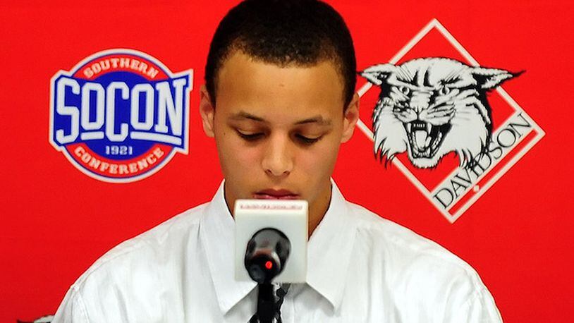 Davidson's Stephen Curry pauses during a news conference where he announced his intent to forego his senior year at Davidson College and enter the NBA draft in Davidson, N.C., on Thursday, April 23, 2009. (Jeff Siner/Charlotte Observer/TNS)