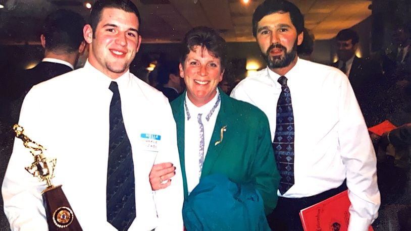 Chaminade Julienne boys basketball coach Charlie Szabo (left) with his parents Ann and Chuck Szabo at the GCL football banquet after his senior season in 1997. CONTRIBUTED/Charlie Szabo