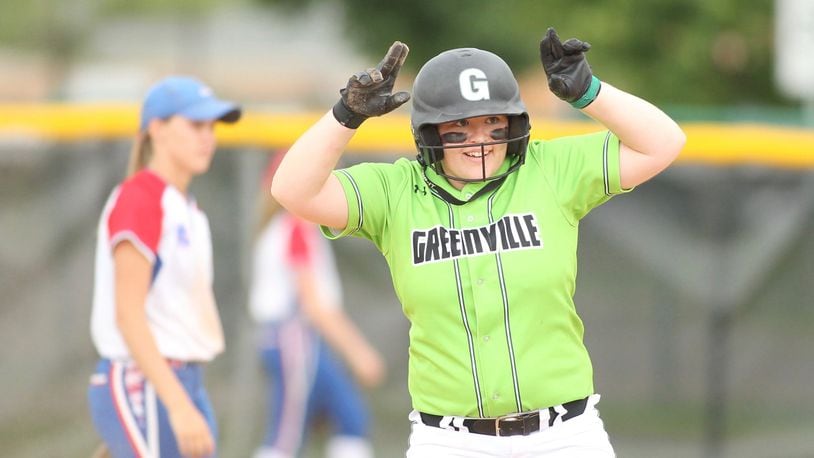 Greenville’s Alli Hill celebrates after an RBI double against Clinton-Massie in a Division II regional semifinal on Wednesday, May 24, 2017, at Mason High School. David Jablonski/Staff