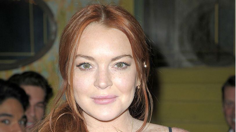 Lindsay Lohan appeared on "Good Morning Britain" and disccused being stopped in an airport and asked to take off her headscarf. (Photo by Chance Yeh/Getty Images)