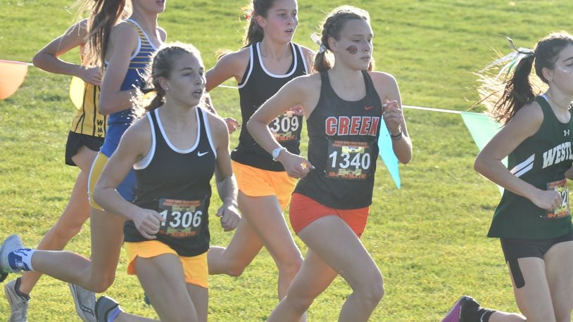 Centerville's Mia Robillard (1309) and Emma Bucher (1306) and Beavercreek's Juliann Williams (1340) finished 1-2-3 at the Division I state championships Saturday at Fortress Obetz. Greg Billing/Contributed