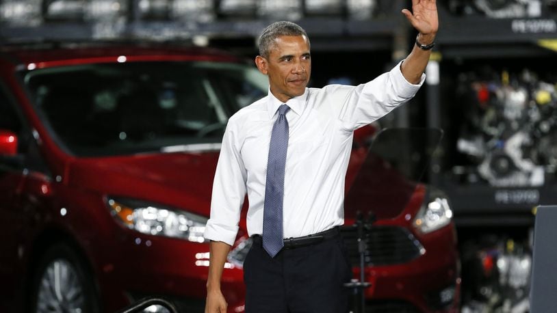 The big issues that will determine President Barack Obama’s legacy include the auto bailout, Obamacare, unrest in the Middle East and continued discontent over the economy. Here Obama waves to the audience at the Ford Michigan Assembly Plant in Wayne, Mich., Wednesday, Jan. 7, 2015. Calling the 2009 federal auto bailout a success story, Obama touted steps taken by his administration that he said have brought the economy and U.S. manufacturing roaring back to life. (AP Photo/Paul Sancya)