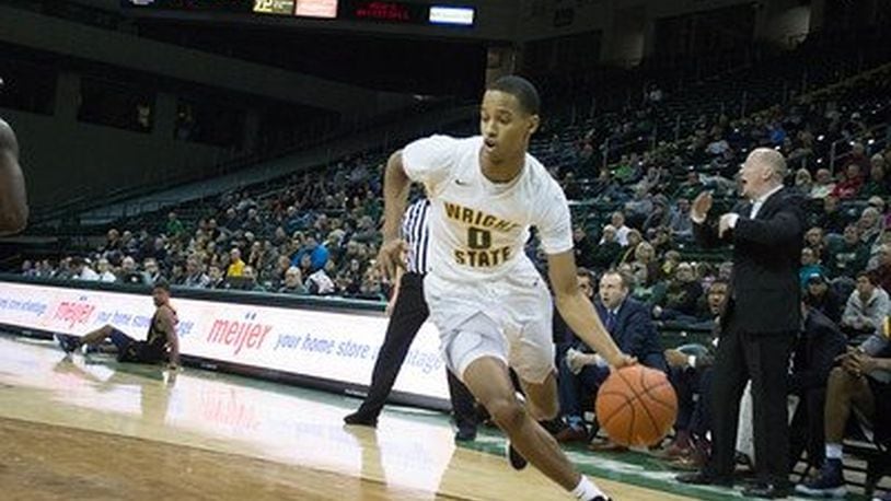 Wright State’s Jaylon Hall pushes the ball up the floor against Kent State on Saturday. ALLISON RODRIGUEZ / CONTRIBUTED