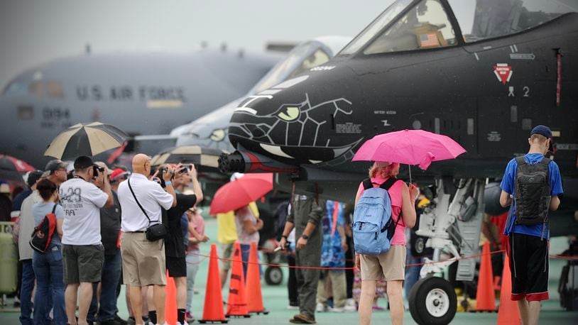 Rainy weather doesn’t stop Spectators from attending the first day of the CenterPoint Energy Dayton Air Show Saturday July 10, 2021. MARSHALL GORBY\STAFF